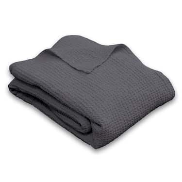 140 x 200 cm waffle piqué lightweight polycotton bedspread in the color anthracite